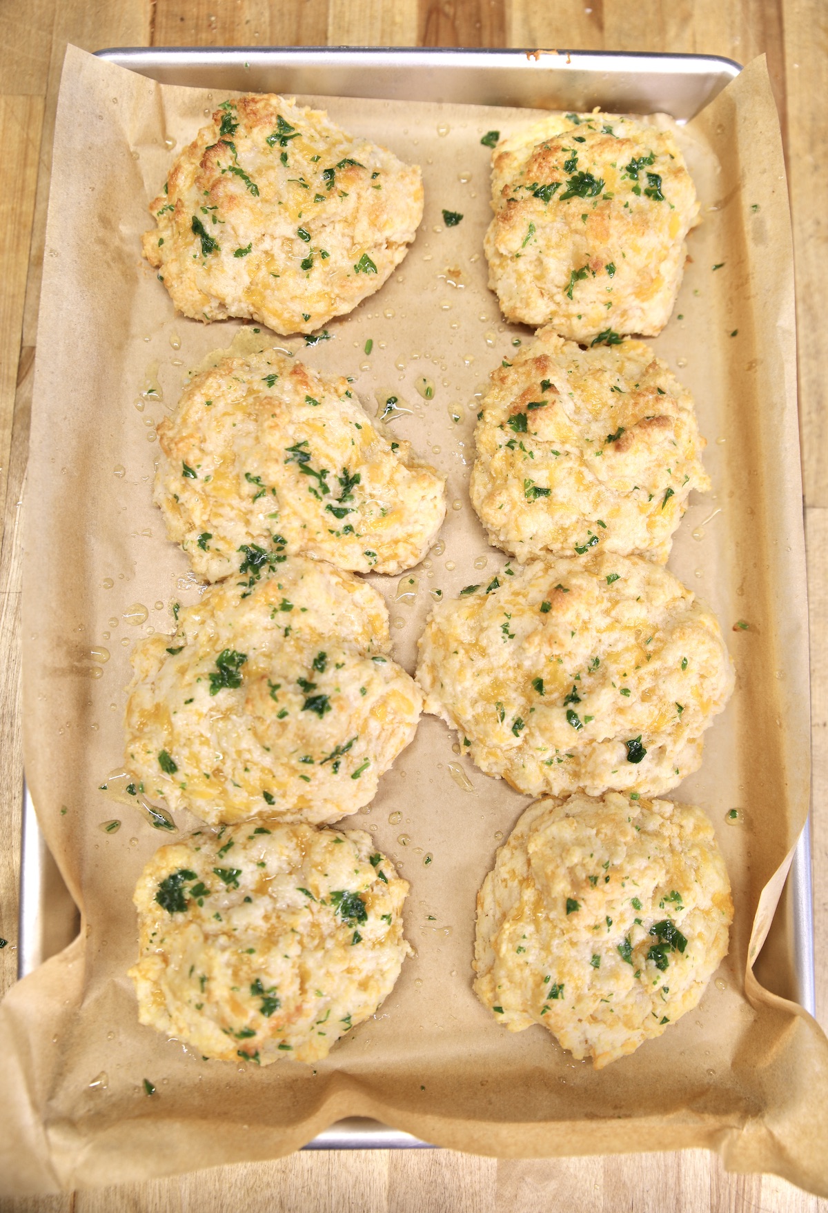 Garlic Cheese Biscuits on a sheet pan.