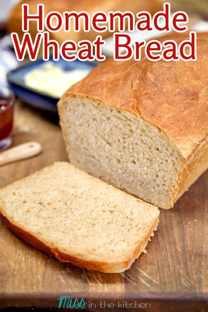 Loaf of wheat bread with one slice, text overlay.