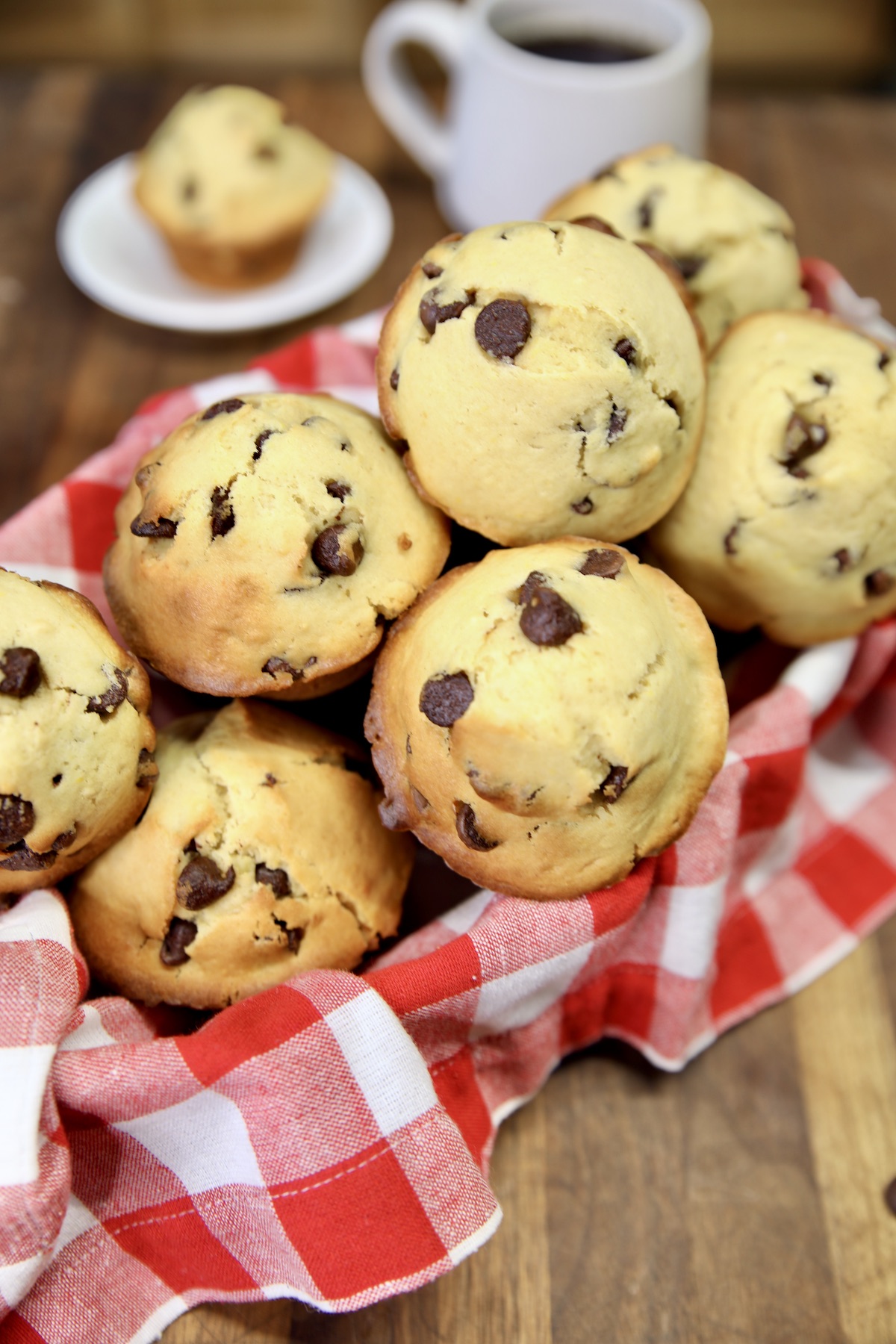 Chocolate chip muffins in a basket.