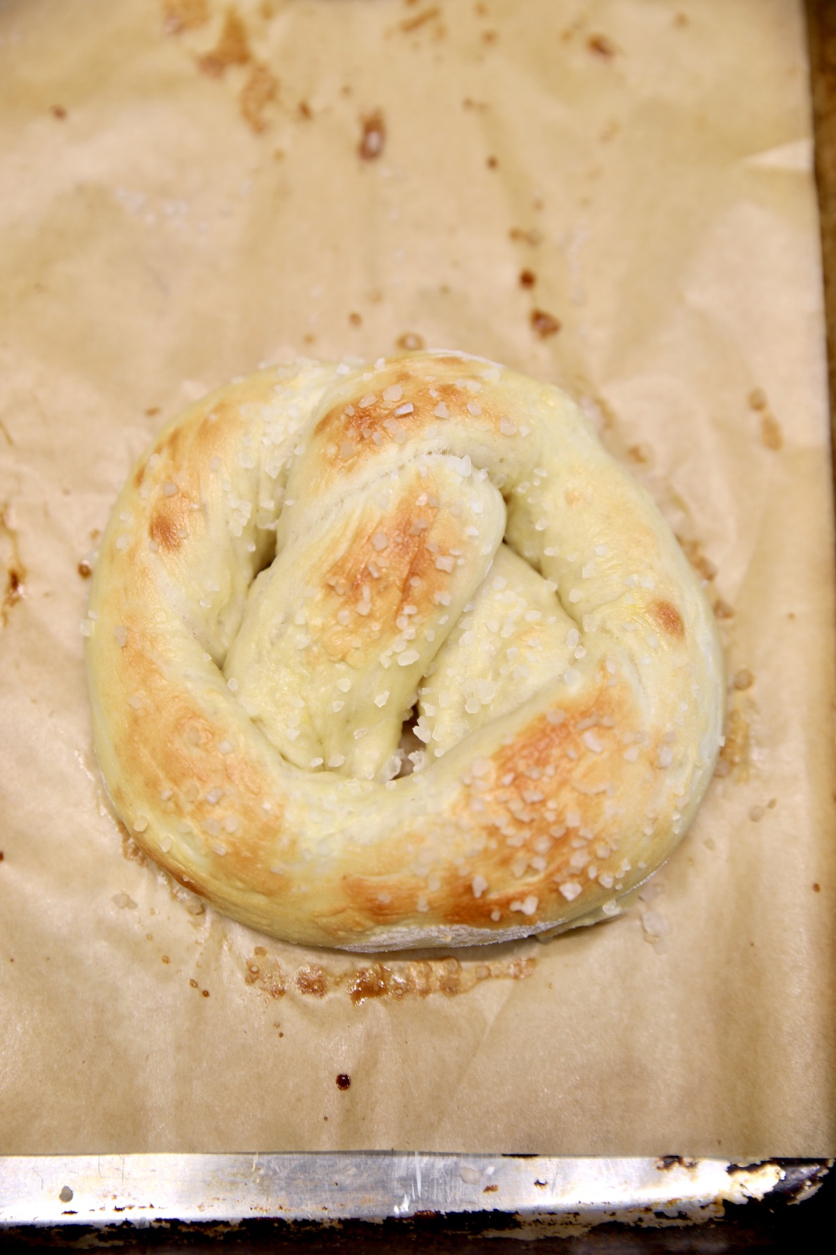Closeup of baked soft pretzel.