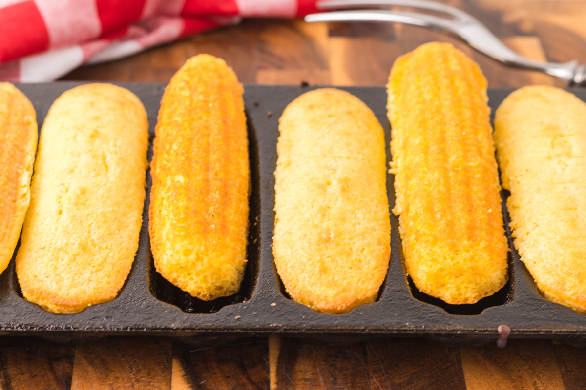 Cornbread sticks in skillet.