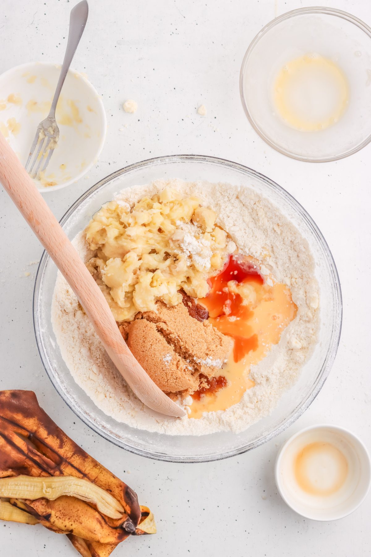 Mixing bowl with banana bread ingredients.
