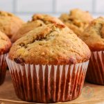 Banana bread muffins on a wood plate