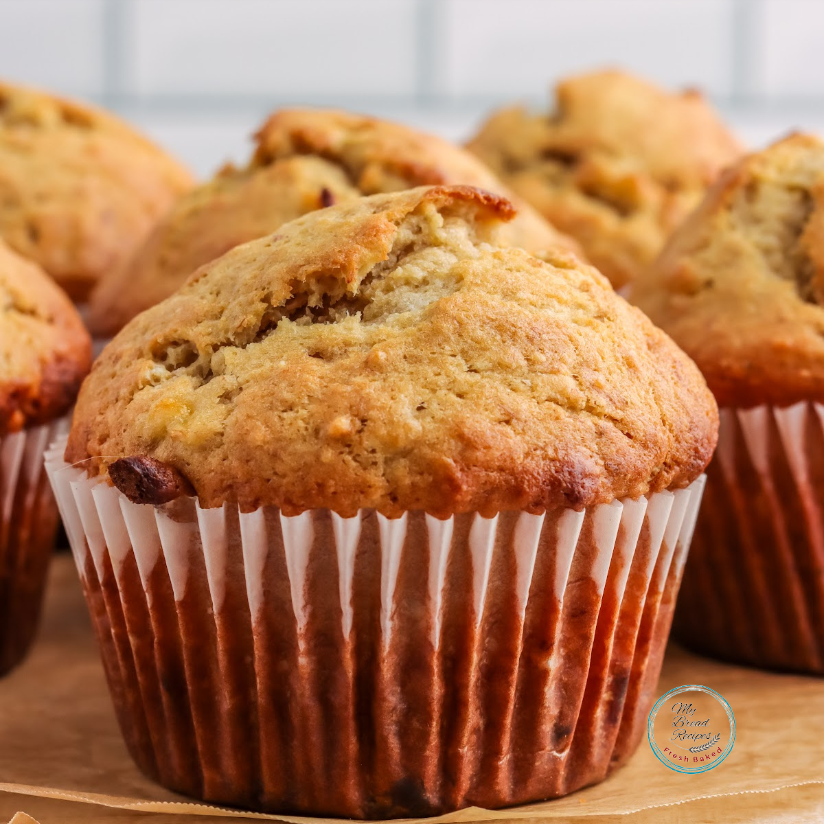 Banana bread muffins on a wood plate