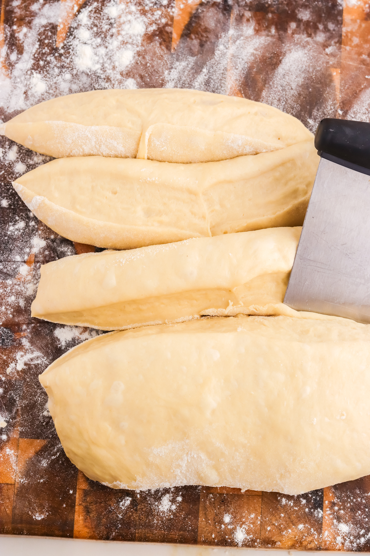 Chunks of pretzel dough. Pretzel dough sliced into chucks.
